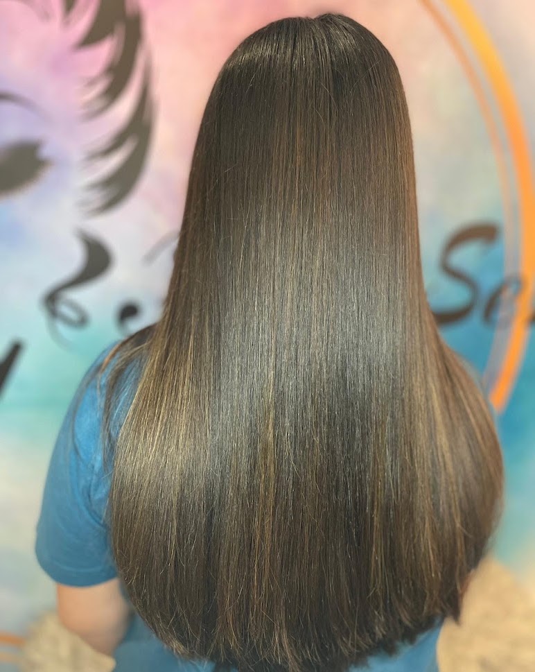 Long hair with a smooth straight finish at HairSense